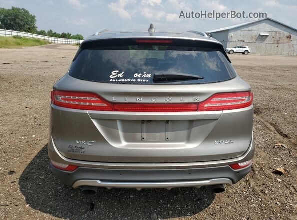 5LMCJ1D93GUJ14997 2016 LINCOLN MKC Бежевый Вид сзади