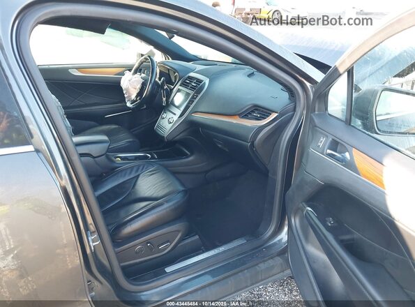 5LMCJ2D90KUL37495 2019 LINCOLN MKC Серый Вид салона спереди