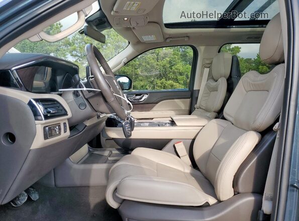 5LMJJ2LG8REL05261 2024 LINCOLN NAVIGATOR Blue Widok wnętrza z przodu