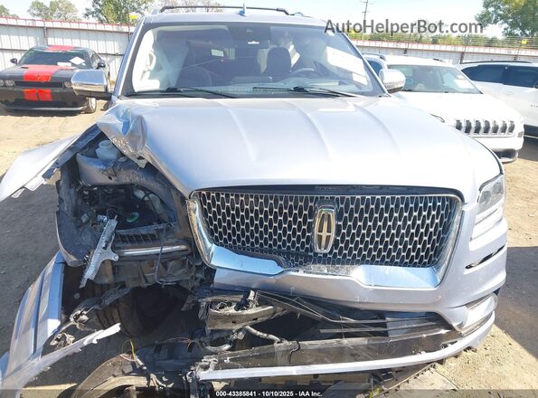 5LMJJ3TTXLEL22282 2020 LINCOLN NAVIGATOR Light Blue Widok wnętrza z tyłu