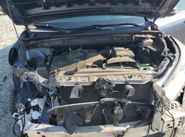 5TDKZRFH0JS269856 2018 TOYOTA HIGHLANDER Blue Vista interior trasera