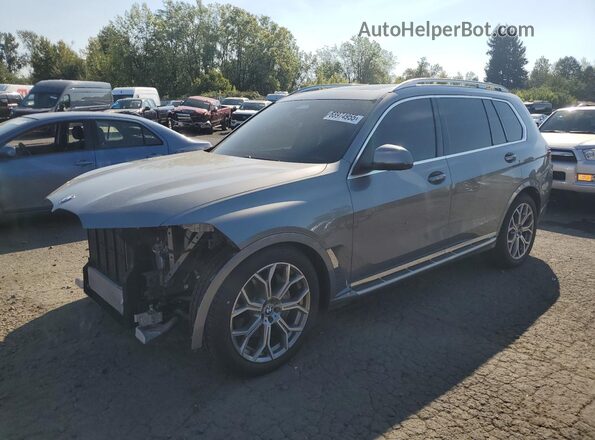 5UX23EM09R9V50652 2024 BMW X7 Gray Vista tres cuartos delantera izquierda