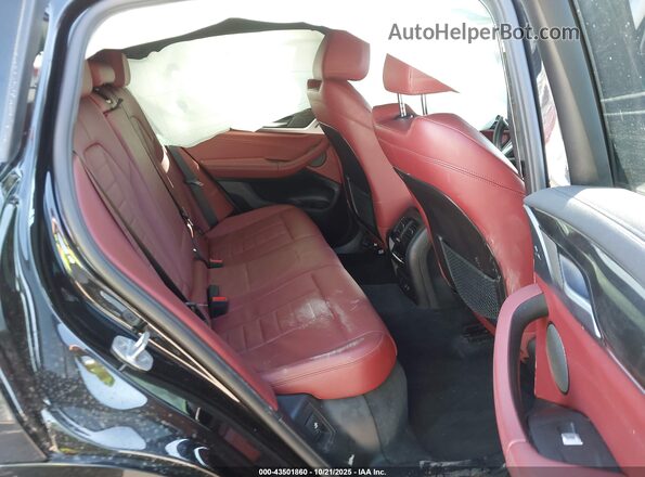 5UX2V1C04L9C56655 2020 BMW X4 Black Vista de la etiqueta del VIN