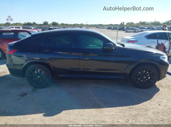 5UX2V1C04L9C56655 2020 BMW X4 Black Vista interior trasera