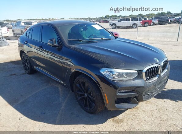 5UX2V1C04L9C56655 2020 BMW X4 Black Delantero derecho