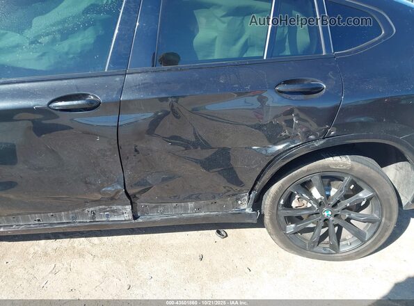 5UX2V1C04L9C56655 2020 BMW X4 Black Vista frontal