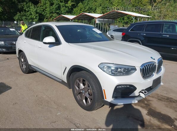 5UX2V1C06M9H87275 2021 BMW X4 Белый Передняя правая четверть