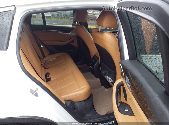 5UX2V1C08L9B34705 2020 BMW X4 White Vista de la etiqueta del VIN