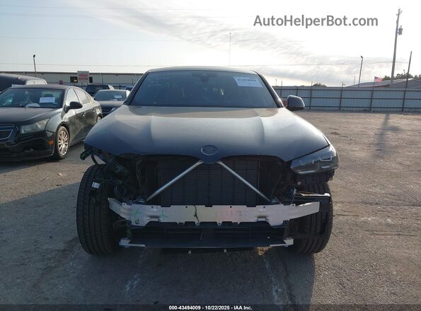 5UX33DT08S9084993 2025 BMW X4 Черный Вид задней части салона