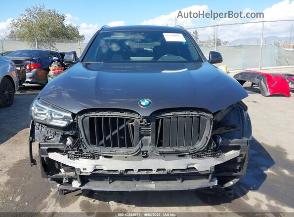 5UX43DP02P9S90378 2023 BMW X3 Black Սալոնի հետևի տեսք