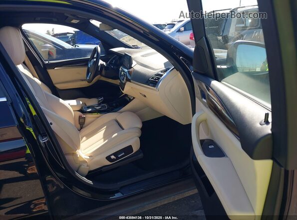 5UX53DP08N9K97238 2022 BMW X3 Black Vista interior delantera