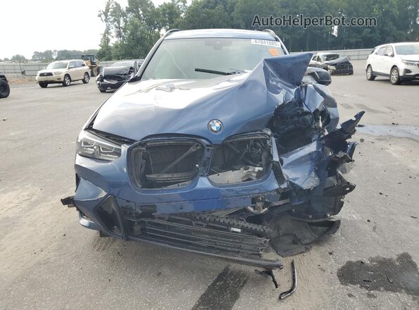 5UX83DP01P9N63411 2023 BMW X3 Синий Вид спереди