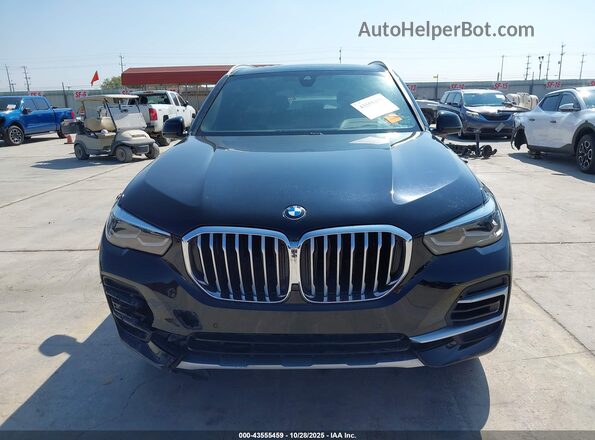 5UXCR4C08P9P71705 2023 BMW X5 Черный Вид панели приборов