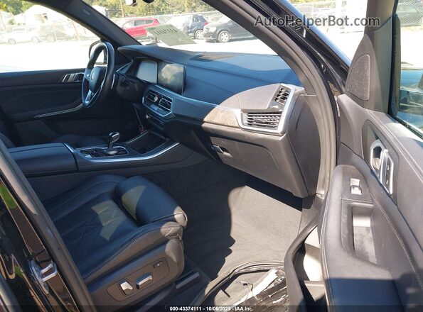 5UXCR6C07P9N44856 2023 BMW X5 Черный Вид салона спереди