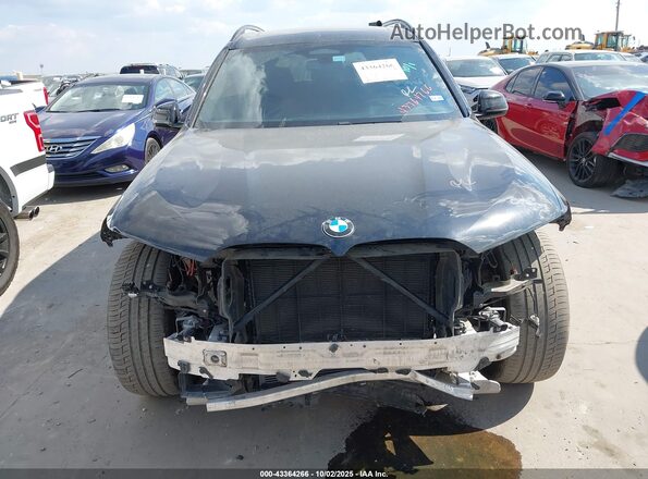 5UXCW2C07M9F35333 2021 BMW X7 Черный Вид спереди