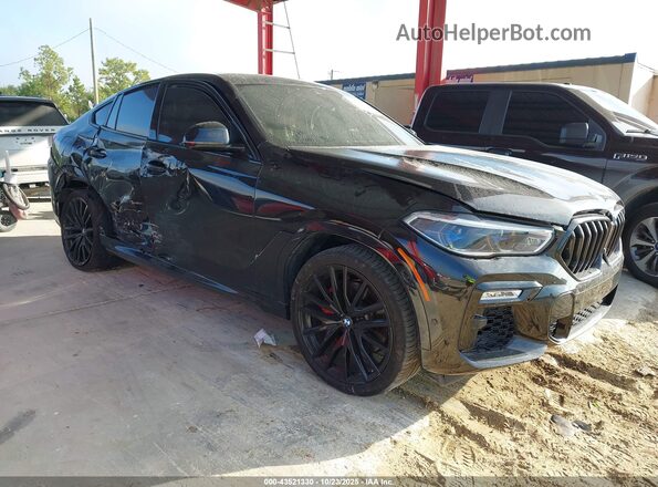 5UXCY4C08M9H29469 2021 BMW X6 Черный Передняя правая четверть