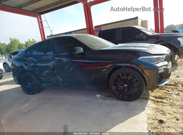 5UXCY4C08M9H29469 2021 BMW X6 Черный Вид задней части салона