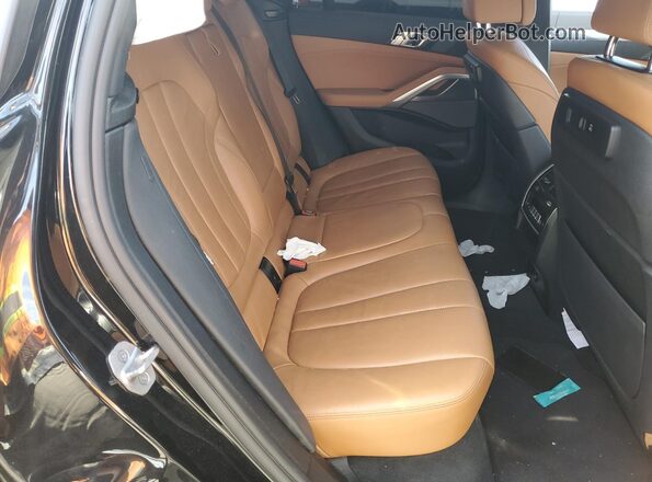 5UXCY4C09M9G02889 2021 BMW X6 Черный Вид задней части салона
