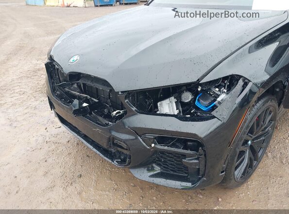 5UXCY8C02P9R68203 2023 BMW X6 Черный Вид спереди
