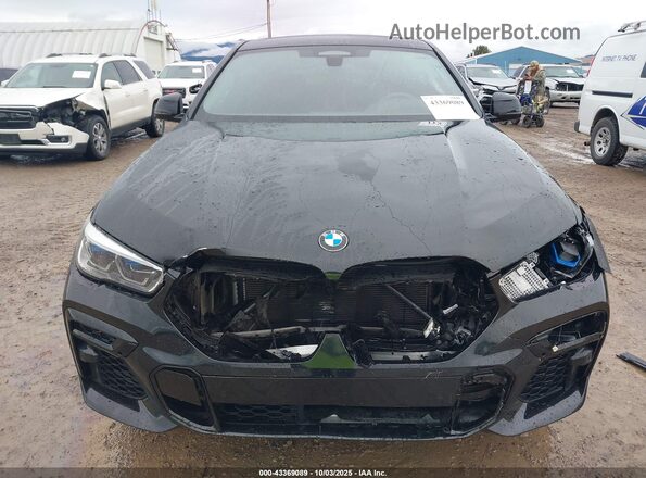 5UXCY8C02P9R68203 2023 BMW X6 Черный Вид задней части салона