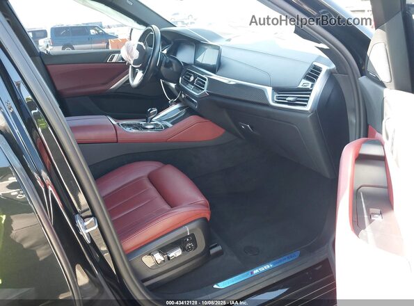 5UXCY8C03M9E15204 2021 BMW X6 Черный Вид салона спереди