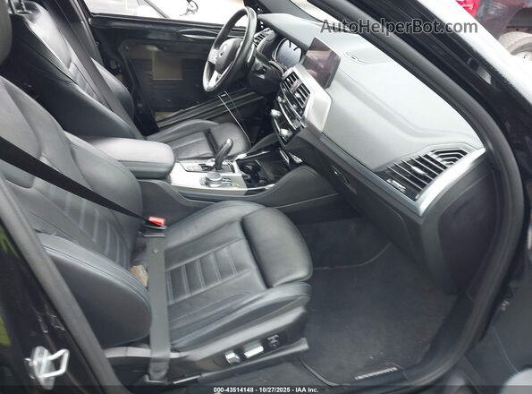 5UXUJ5C56KLJ63237 2019 BMW X4 Черный Вид салона спереди