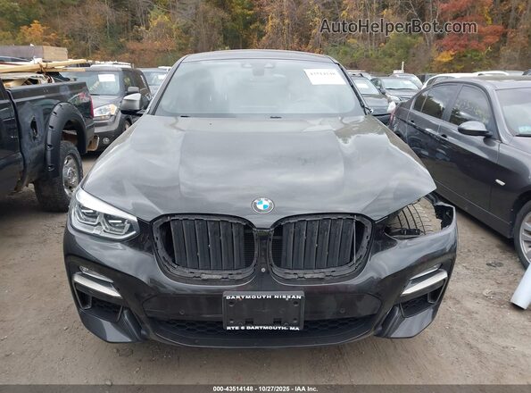 5UXUJ5C56KLJ63237 2019 BMW X4 Черный Вид задней части салона