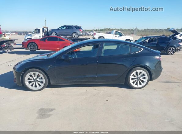 5YJ3E1EB8NF243448 2022 TESLA MODEL 3 Black Widok wnętrza z tyłu