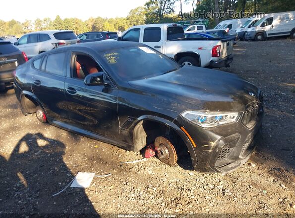 5YMCY0C0XM9G56512 2021 BMW X6 M Black Widok wnętrza z tyłu