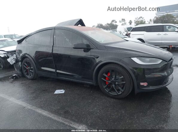 7SAXCBE63RF440021 2024 TESLA MODEL X Черный Вид задней части салона