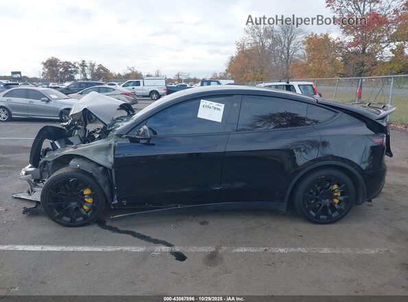 7SAYGAEE0SF285203 2025 TESLA MODEL Y Черный Вид задней части салона