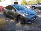 2025 Tesla Model Y Long Range Dual Motor All-wheel Drive Gray vin: 7SAYGAEE1SF221655