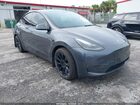 2023 Tesla Model Y Awd/long Range Dual Motor All-wheel Drive Gray vin: 7SAYGAEE5PF643676