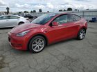 2022 Tesla Model Y Burgundy vin: 7SAYGAEE6NF314563