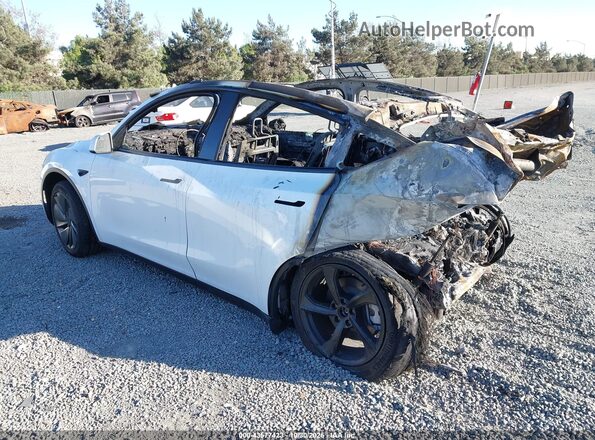 7SAYGDED2TF399701 2026 TESLA MODEL Y White Tył lewy