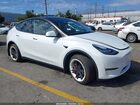 2023 Tesla Model Y Awd/long Range Dual Motor All-wheel Drive White vin: 7SAYGDEE0PA064707