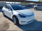 2022 Tesla Model Y Long Range Dual Motor All-wheel Drive White vin: 7SAYGDEE2NF362272