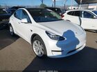 2023 Tesla Model Y Awd/long Range Dual Motor All-wheel Drive White vin: 7SAYGDEE3PA039610