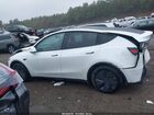 2026 Tesla Model Y Long Range Dual Motor All-wheel Drive/long Range Launch Series White vin: 7SAYGDEE3TF322344