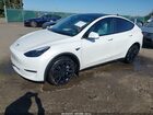2023 Tesla Model Y Awd/long Range Dual Motor All-wheel Drive White vin: 7SAYGDEE6PF830331
