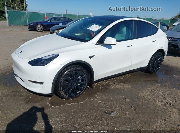 7SAYGDEE6PF830331 2023 TESLA MODEL Y White Vista tres cuartos delantera izquierda