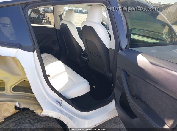 7SAYGDEE6PF830331 2023 TESLA MODEL Y White Vista de la etiqueta del VIN
