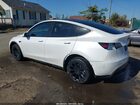 2023 Tesla Model Y Awd/long Range Dual Motor All-wheel Drive White vin: 7SAYGDEE6PF830331
