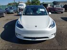 2023 Tesla Model Y Awd/long Range Dual Motor All-wheel Drive White vin: 7SAYGDEE6PF830331