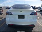 2025 Tesla Model Y Long Range Dual Motor All-wheel Drive White vin: 7SAYGDEE6SF218820