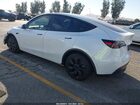 2025 Tesla Model Y Long Range Dual Motor All-wheel Drive White vin: 7SAYGDEE6SF218820