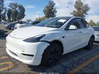 2025 Tesla Model Y Long Range Dual Motor All-wheel Drive White vin: 7SAYGDEE6SF218820