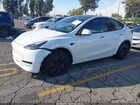2025 Tesla Model Y Long Range Dual Motor All-wheel Drive White vin: 7SAYGDEE6SF218820