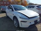 2026 Tesla Model Y   White vin: 7SAYGDEE6TF330681