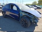 2024 Tesla Model Y Long Range Dual Motor All-wheel Drive Blue vin: 7SAYGDEE7RA323793